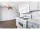 Kitchen with stainless steel appliances, quartz countertops, and hardwood style flooring at 1440 Vegas Valley Dr # 13, Las Vegas, NV 89169