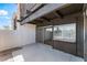 Patio with privacy fence and sliding glass door to indoor living space at 1440 Vegas Valley Dr # 13, Las Vegas, NV 89169