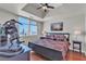 Cozy bedroom with a large window showcasing city views, complemented by comfortable furnishings at 150 Las Vegas Blvd # 1906, Las Vegas, NV 89101
