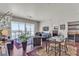 Spacious living room with city views, hardwood floors, comfortable seating, and modern decor at 150 Las Vegas Blvd # 1906, Las Vegas, NV 89101