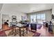 Inviting living room with hardwood floors, modern furnishings, and a sliding glass door to the balcony at 150 Las Vegas Blvd # 1906, Las Vegas, NV 89101