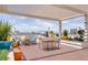 Elegant rooftop patio featuring a covered pergola with inviting seating and vibrant planters, ideal for relaxing and socializing at 150 Las Vegas Blvd # 1906, Las Vegas, NV 89101