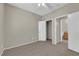 This bedroom offers carpet and has a closet and an ensuite at 1553 Ivygate Ave, Las Vegas, NV 89183