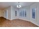 Light-filled dining room with wood-style floors and plantation shutters at 1643 Silver Slipper Ave, Henderson, NV 89002
