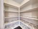 Walk-in pantry with custom shelving at 1643 Silver Slipper Ave, Henderson, NV 89002