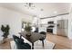 Dining area adjoining a kitchen with stainless steel appliances, creating a perfect space for gathering at 1700 Sweeney Ave, Las Vegas, NV 89104