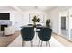 Modern dining space with art, a fireplace, and seamless flow into the living area at 1700 Sweeney Ave, Las Vegas, NV 89104