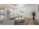 Bright living area with a ceiling fan, a neutral palette, and seamless flow into other rooms at 1700 Sweeney Ave, Las Vegas, NV 89104