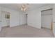 Neutral bedroom featuring carpet, ceiling fan, and closet space at 1705 Westwind Rd, Las Vegas, NV 89146