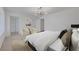 Staged bedroom featuring a king bed, stylish decor, and plenty of natural light at 1705 Westwind Rd, Las Vegas, NV 89146