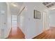 Hallway with wood floors, access to bathroom, and bedroom at 1705 Westwind Rd, Las Vegas, NV 89146