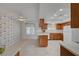 Bright kitchen with tiled floors, ample counter space, and a cozy breakfast nook at 1705 Westwind Rd, Las Vegas, NV 89146