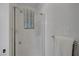 Walk-in shower features clean subway tile, glass door, and modern fixtures at 1705 Westwind Rd, Las Vegas, NV 89146