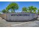 Westwind Circle sign and a decorative cinder block perimeter wall, as seen from the street at 1705 Westwind Rd, Las Vegas, NV 89146