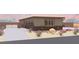 Charming single-story home featuring desert landscaping, three-car garage, and gated entrance at 1840 Old West Ave, Pahrump, NV 89048