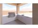 Stylish outdoor kitchen featuring stainless steel grill, sink, and white cabinets at 1840 Old West Ave, Pahrump, NV 89048