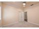 Cozy bedroom featuring carpet flooring, a ceiling fan, and neutral paint at 1869 Desert Forest Way, Henderson, NV 89012