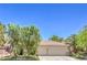 Charming single-story home with a three-car garage, mature trees and well-manicured landscaping at 1869 Desert Forest Way, Henderson, NV 89012