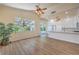 Light-filled living area connects to a modern kitchen, enhanced by a view of the outdoor space at 1869 Desert Forest Way, Henderson, NV 89012