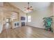 Inviting living area with stone accent wall, fireplace, and open floor plan, great for gatherings at 1869 Desert Forest Way, Henderson, NV 89012