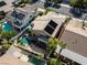 Overhead perspective of a home with a private pool and patio, emphasizing the outdoor living space and neighborhood at 1870 Desert Forest Way, Henderson, NV 89012