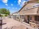 Large backyard with spacious patio, privacy fence, and mature landscaping at 1870 Desert Forest Way, Henderson, NV 89012
