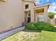 Charming front exterior of the home with well-maintained lawn and walkway at 1870 Desert Forest Way, Henderson, NV 89012