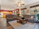 Spacious living room with wood flooring, natural light, and an open layout perfect for entertaining at 1870 Desert Forest Way, Henderson, NV 89012