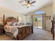 Relaxing main bedroom with vaulted ceilings and private balcony access at 1870 Desert Forest Way, Henderson, NV 89012