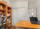 Bright home office featuring a large desk and ample storage space at 1870 Desert Forest Way, Henderson, NV 89012