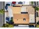 Aerial view of a residence showcasing the rooftop, driveway, yard, and landscaping at 1916 Howard Ave, Las Vegas, NV 89104
