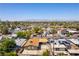 Aerial view of home in a sprawling suburban neighborhood, with mountain views at 1916 Howard Ave, Las Vegas, NV 89104