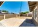 Spacious backyard with concrete patio and block wall, perfect for outdoor entertaining at 1916 Howard Ave, Las Vegas, NV 89104