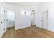 This bedroom offers wood-look floors and easy access to a bathroom at 1916 Howard Ave, Las Vegas, NV 89104