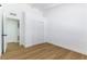 This bedroom features wood-look floors and an enclosed closet at 1916 Howard Ave, Las Vegas, NV 89104