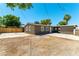 Exterior of home with a covered carport and ample parking space at 1916 Howard Ave, Las Vegas, NV 89104
