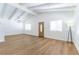 Bright living room featuring high vaulted ceilings, wood flooring and white walls at 1916 Howard Ave, Las Vegas, NV 89104