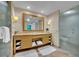 Bathroom features double vanity, linen storage, and glass enclosed shower at 2000 N Fashion Show Dr # 2222, Las Vegas, NV 89109