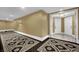 Hallway with decorative carpet design leading to a condo entrance with double doors at 2000 N Fashion Show Dr # 2222, Las Vegas, NV 89109
