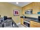 Well-equipped kitchen with stainless steel appliances and wooden cabinets at 2000 N Fashion Show Dr # 2222, Las Vegas, NV 89109