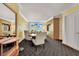 Spacious living area with dining table, built-in storage and comfortable chairs at 2000 N Fashion Show Dr # 2222, Las Vegas, NV 89109