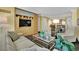Comfortable living area adjacent to kitchen with stainless appliances at 2000 N Fashion Show Dr # 2222, Las Vegas, NV 89109
