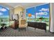 Bright living room featuring a geometric rug, a console, chair, and a large window view of the city at 2000 N Fashion Show Dr # 2222, Las Vegas, NV 89109