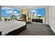 Comfortable main bedroom boasting ample natural light, city views, and refined contemporary design elements at 2000 N Fashion Show Dr # 2222, Las Vegas, NV 89109