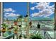 Beautiful view from window with bright blue skies, enhanced by plants at 2000 N Fashion Show Dr # 2222, Las Vegas, NV 89109