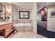 The bathroom includes a soaking tub with marble surround, a vanity, and walk in closet at 2000 N Fashion Show Dr # 2308, Las Vegas, NV 89109