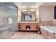 The bathroom features a large vanity, soaking tub, and walk-in shower at 2000 N Fashion Show Dr # 2308, Las Vegas, NV 89109