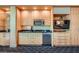 This modern kitchenette is equipped with stainless steel appliances and custom cabinets at 2000 N Fashion Show Dr # 2308, Las Vegas, NV 89109