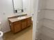 Standard bathroom features a single sink vanity and shower over tub, plus shelving at 2019 Rancho Lake Dr # 102, Las Vegas, NV 89108