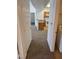 Hallway looking towards kitchen and laundry area, showcasing the interior layout at 2019 Rancho Lake Dr # 102, Las Vegas, NV 89108